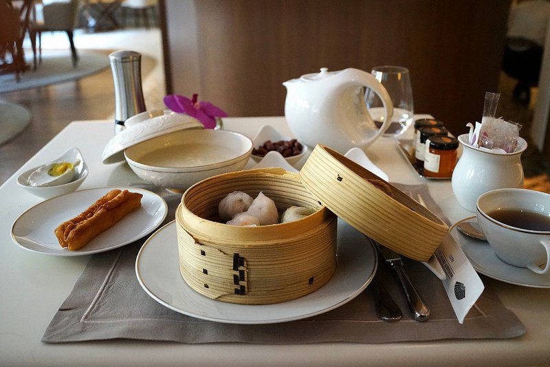Sleep in, breakfast is served until late. We're partial to the Hong Kong breakfast. Dim sum steamed to order and jook with all the fixings.<br/>